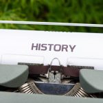 A Typewriter Loaded With A Piece Of Paper Titled "History."