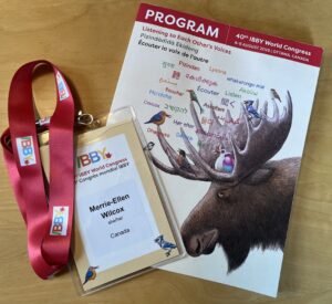 A conference program and lanyard.